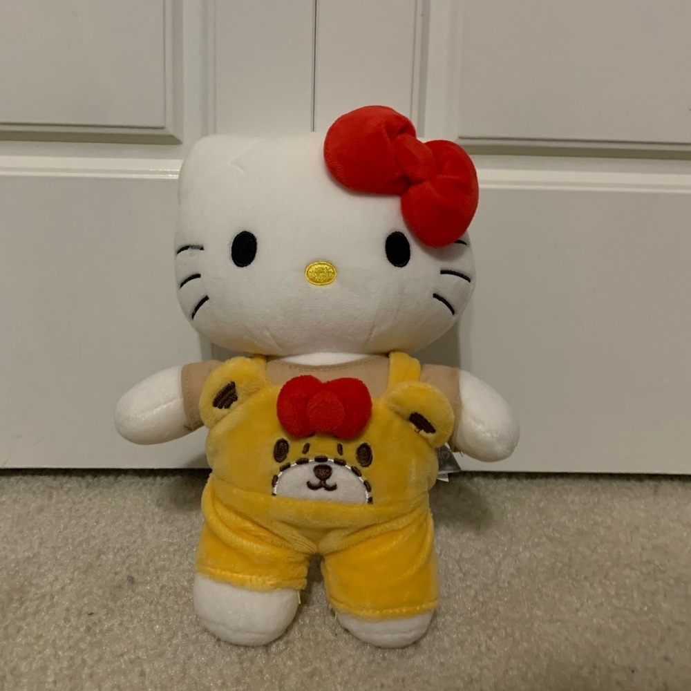 Hello Kitty Plush Toy with Red Bow and Yellow Outfit